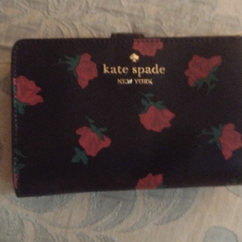 Kate Spade New leather wallet $70